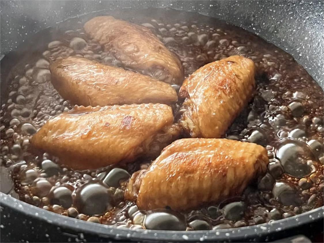 Chicken wings boiled in coke