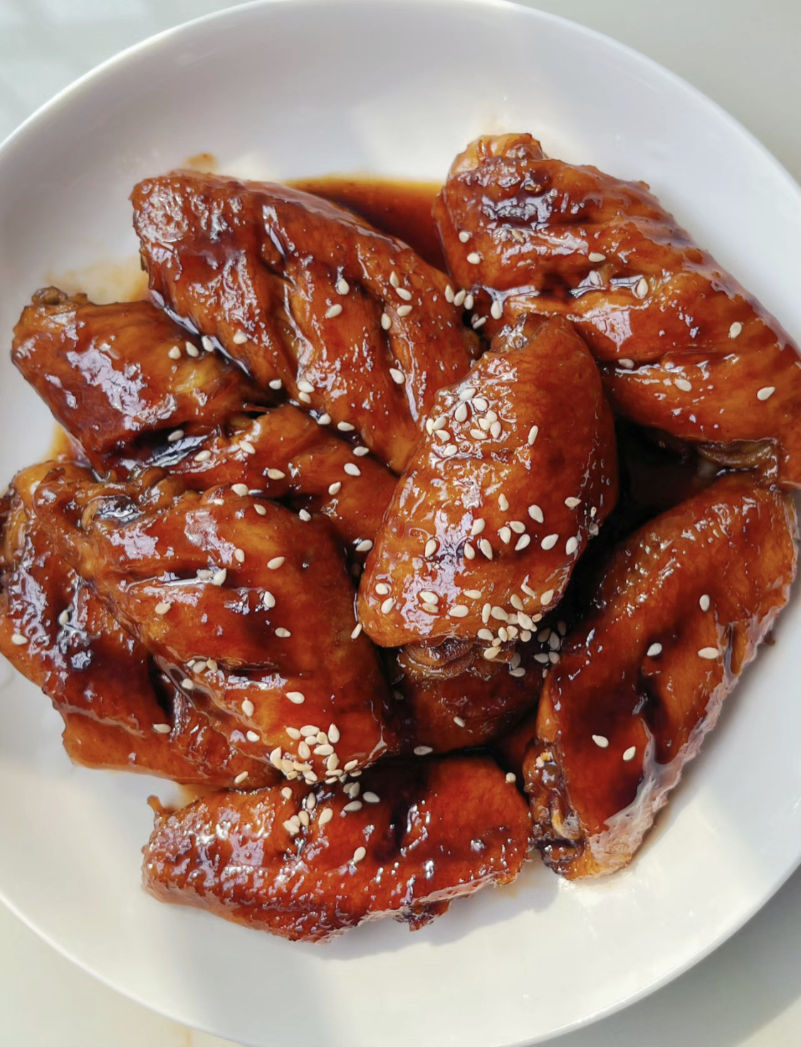 A plate of Coca-Cola chicken wings